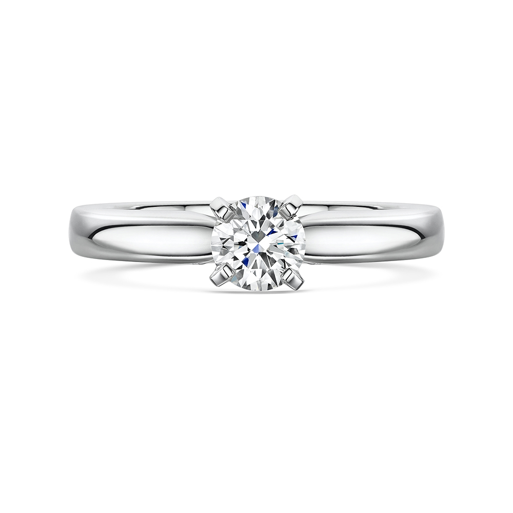 platinum four claw solitaire engagement ring featuring a round brilliant cut diamond